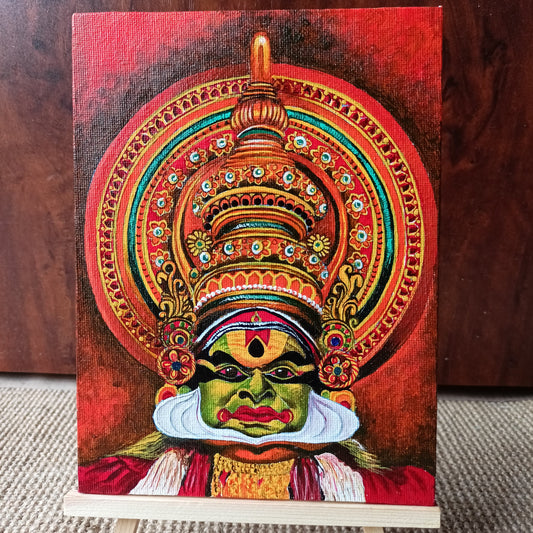 Colorful painting of a stylized face on a wooden stand with a dark brown background